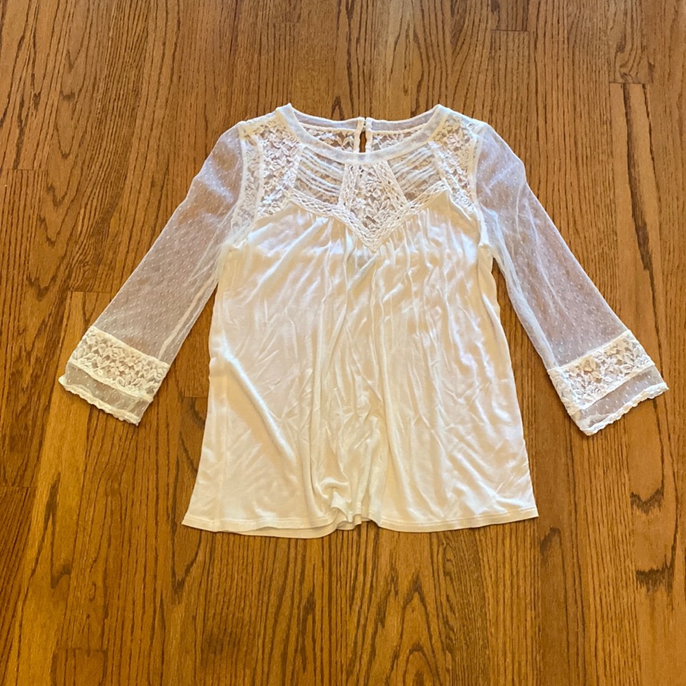 Express soft fun casual top with lace/sheer sleeve.